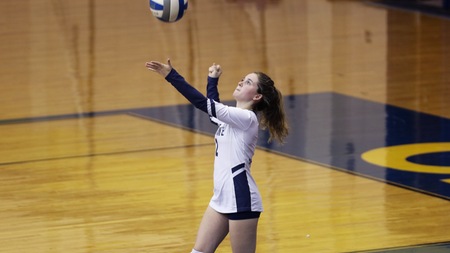 Caitlyn Williams lines up a serve.